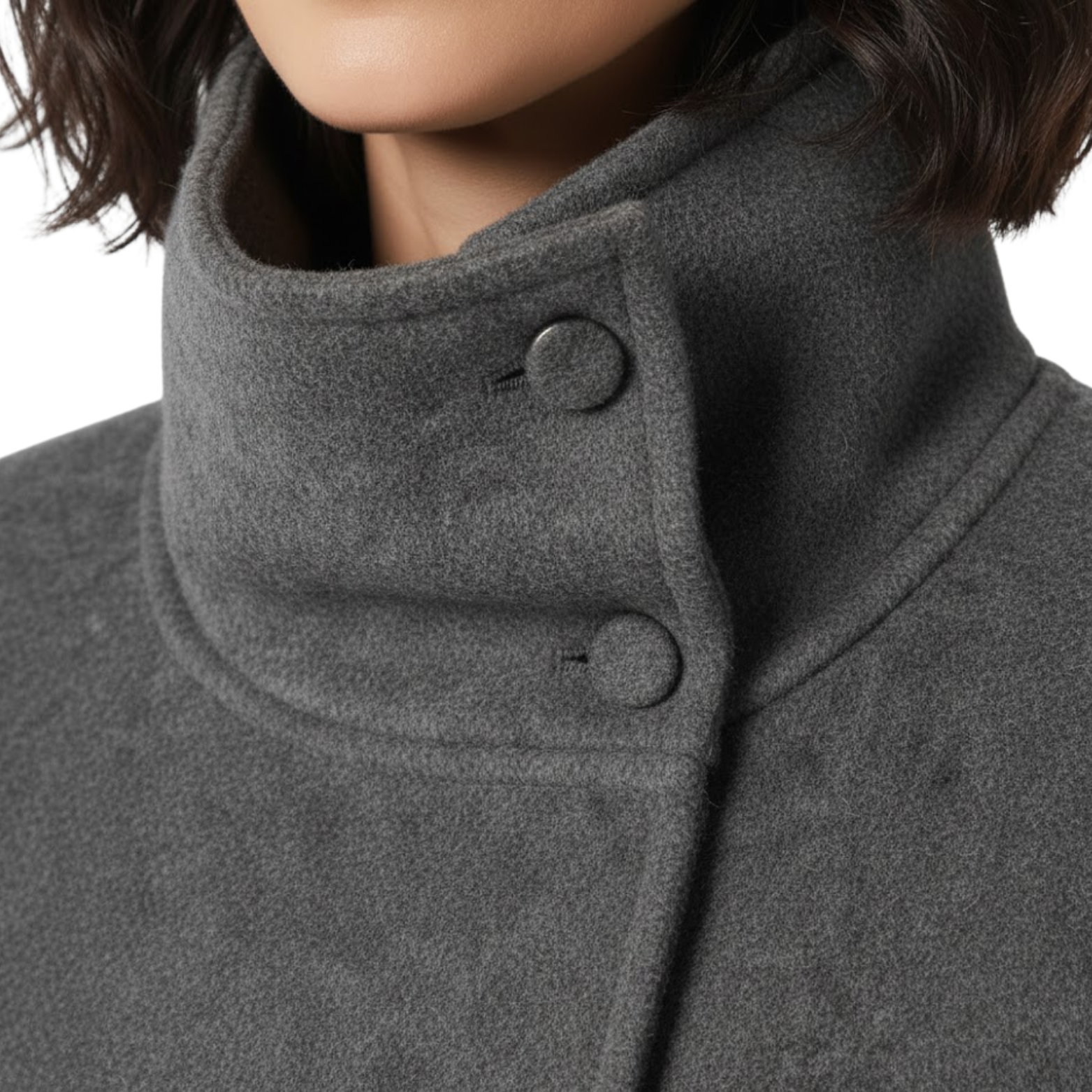 Hosszú, kétsoros gombolású, hajtókás galléros, formás kabát