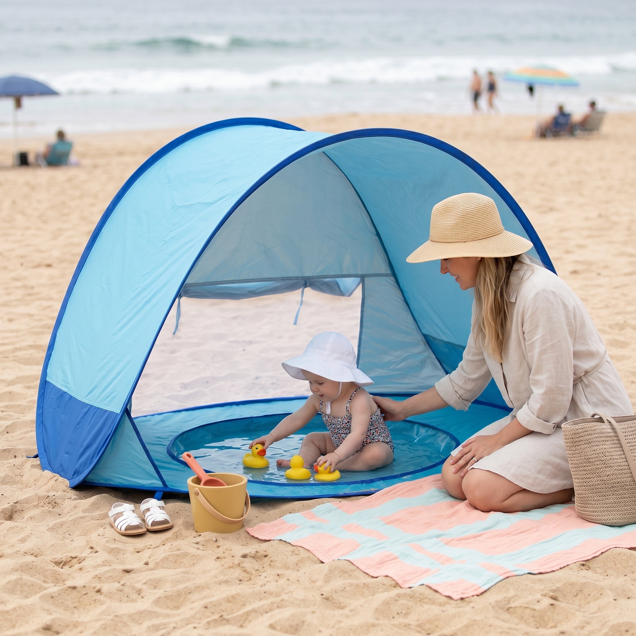 Tienda de playa para bebé con piscina integrada y protección solar UPF 50+