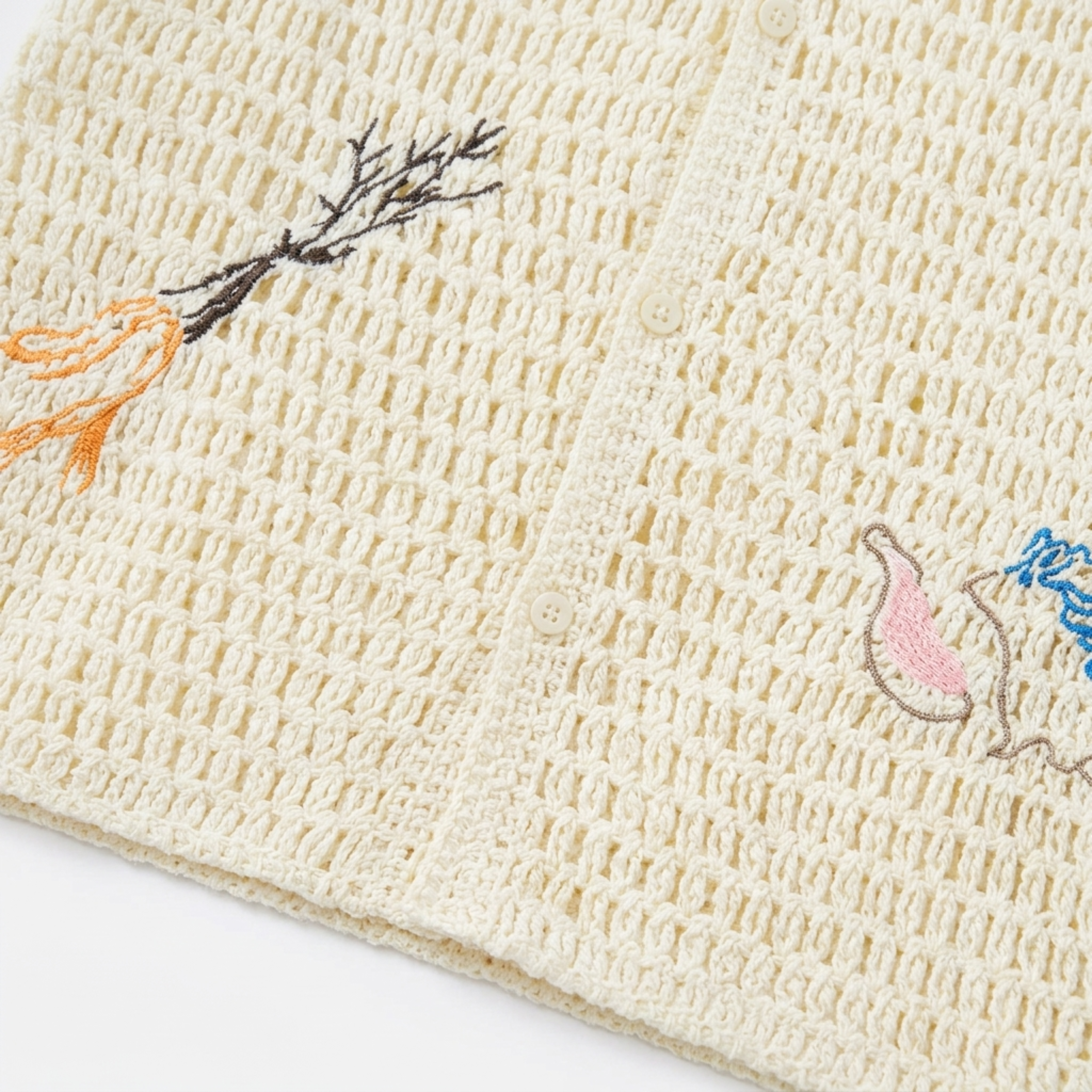 Men's crocheted polo — botanical embroidery — summer resort style