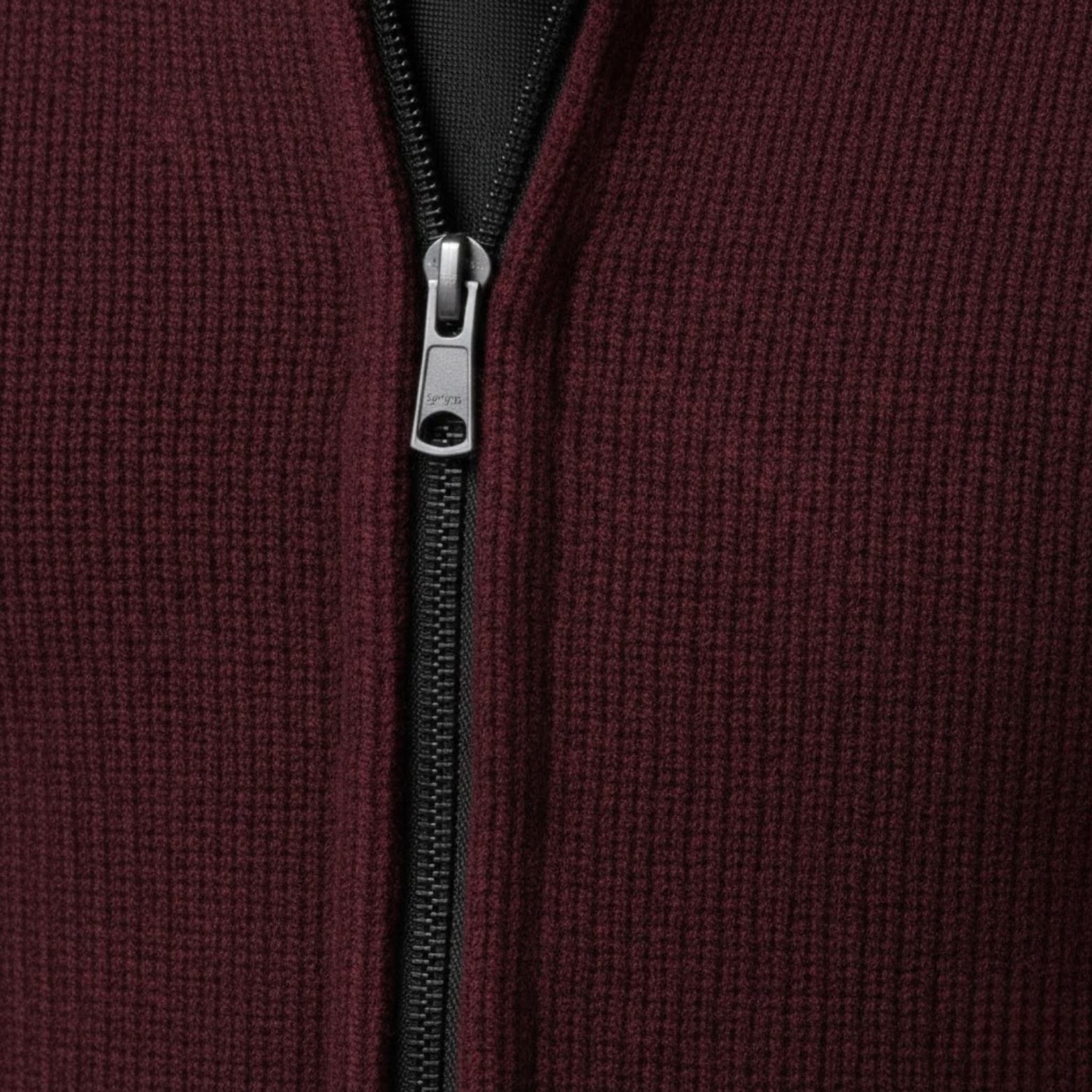 Sleeveless knitted vest with zipper and stand-up collar
