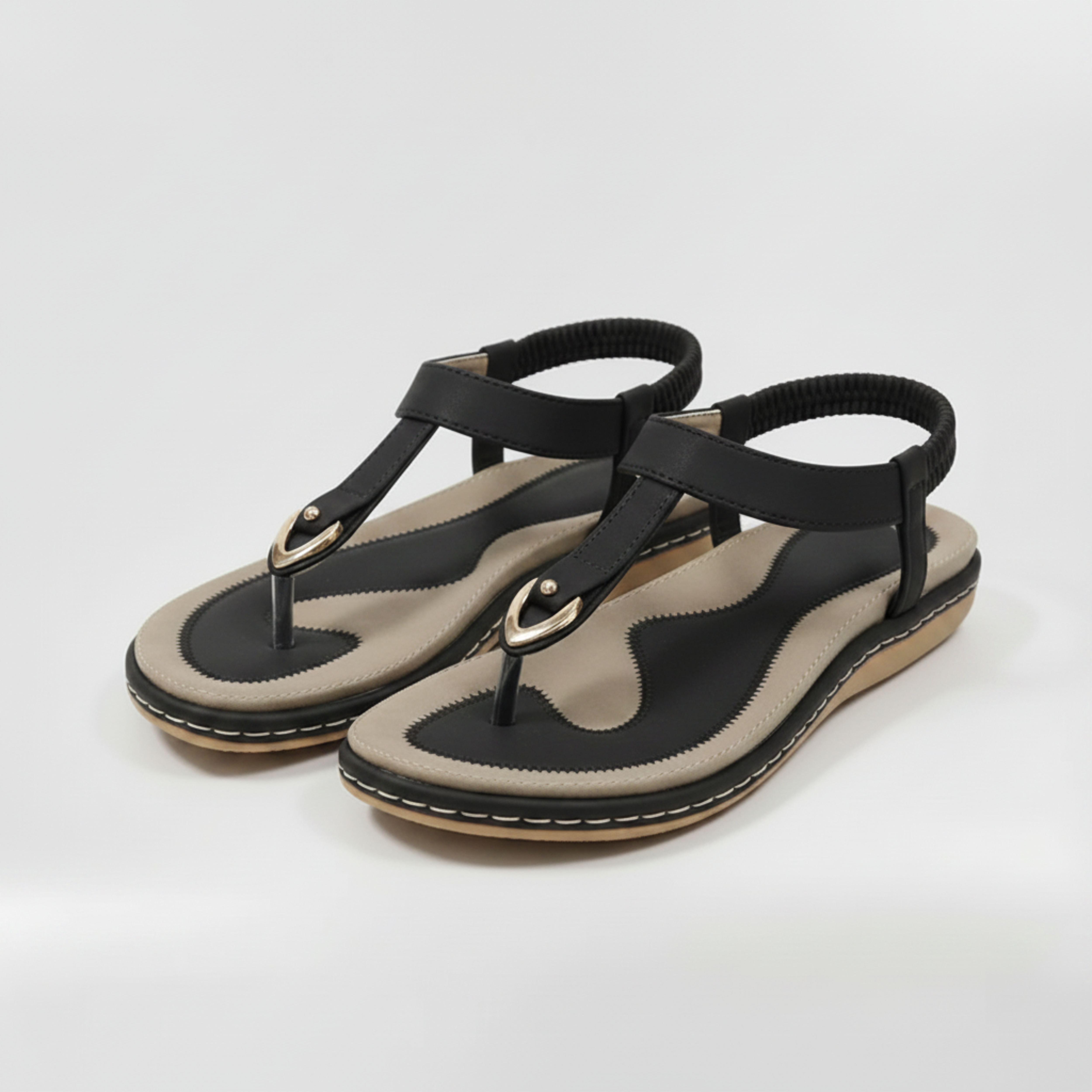 Flade sandaler til kvinder med elastisk bagrem og metal detalje