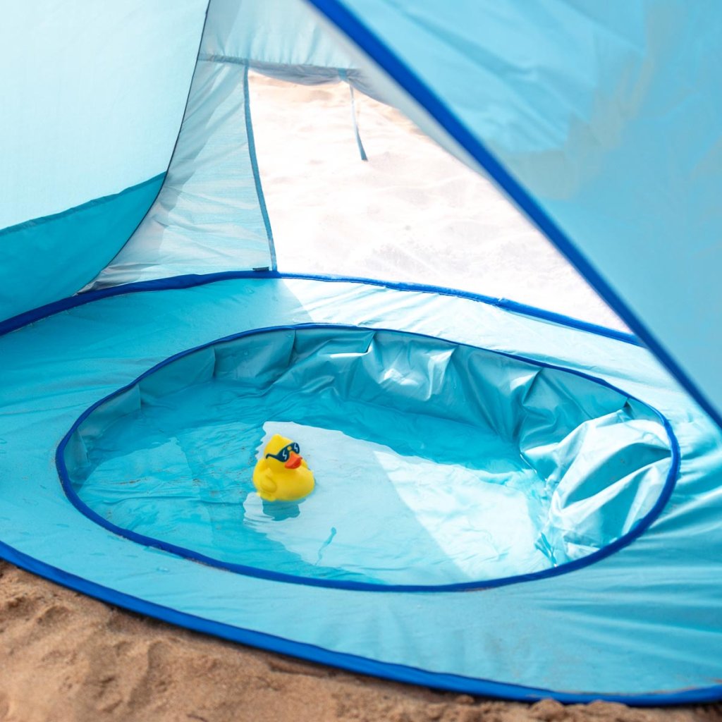 Tienda de playa para bebé con piscina integrada y protección solar UPF 50+